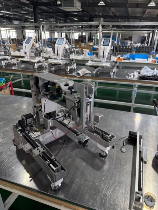 EmbNova machine mechanism during assembly